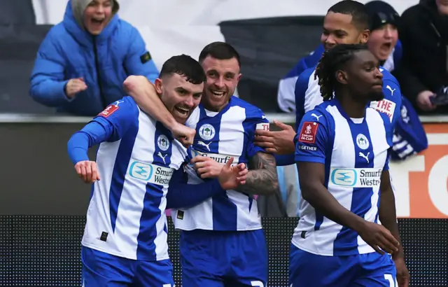 Wigan Athletic's Jonny Smith celebrates scoring their first goal