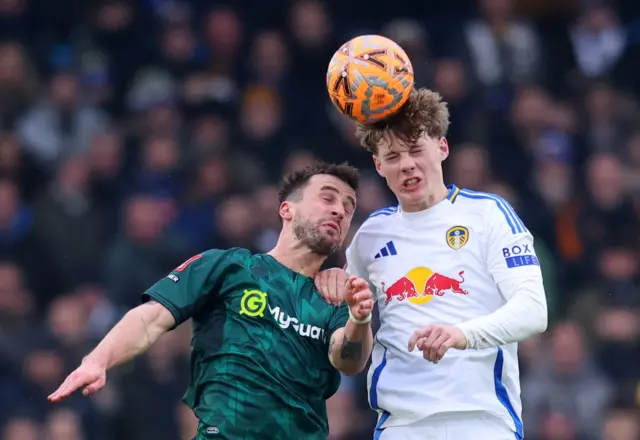 Millwall's Joe Bryan in action with Leeds United's Sam Chambers