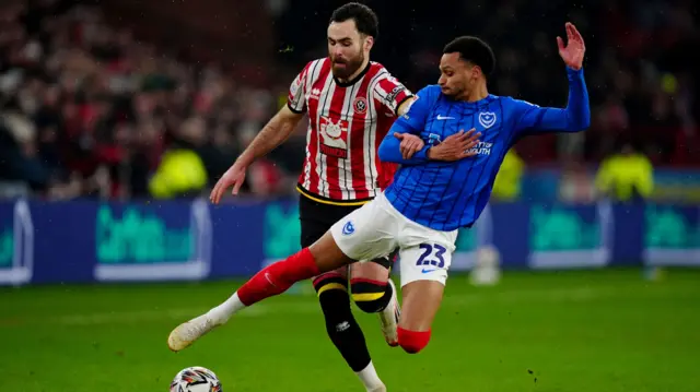 Portsmouth Josh Murphy tries to tackle Sheffield United striker Ben Brereton Diaz