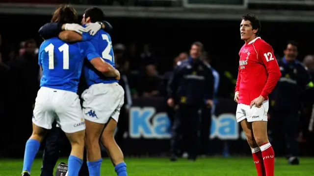 James Hook watches Italy celebrate their win