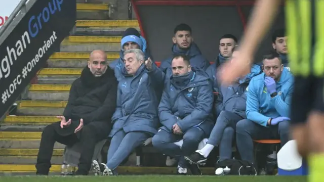 Pep Guardiola and assistant coach Juan Manuel Lillo speak