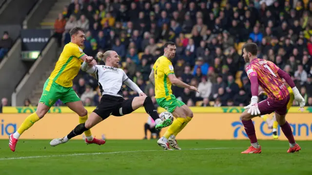 Lars-Jorgen Salvesen finishes past Angus Gunn but the goal is disallowed