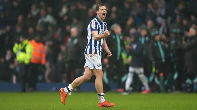 Jayson Molumby celebrates scoring