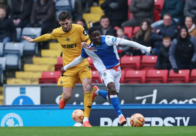 Blackburn Rovers' Augustus Kargbo in action with Wolverhampton Wanderers' Santiago Bueno