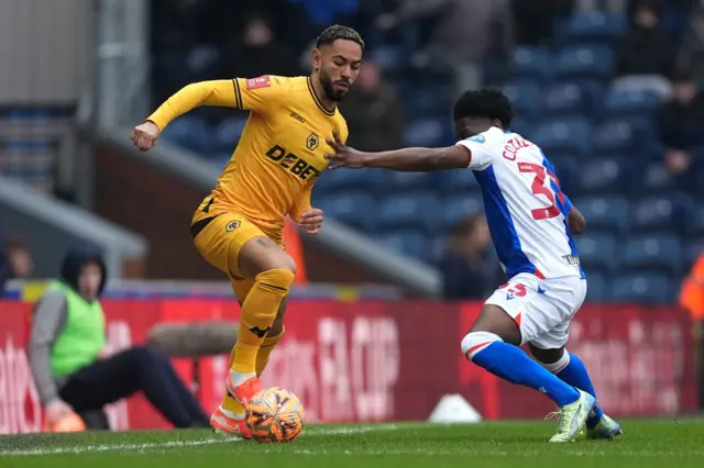 Wolverhampton Wanderers' Matheus Cunha and Blackburn Rovers' Amario Cozier-Duberry battle for the ball