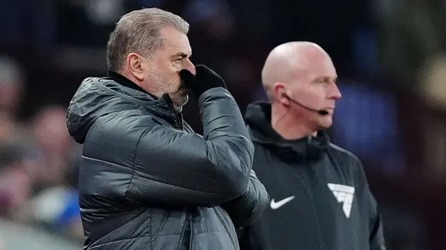 Tottenham Hotspur manager Ange Postecoglou (left) reacts on the touchline