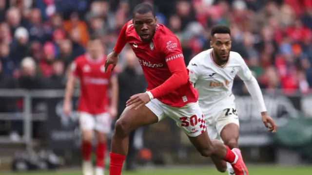 Sinclair Armstrong of Bristol chases the ball