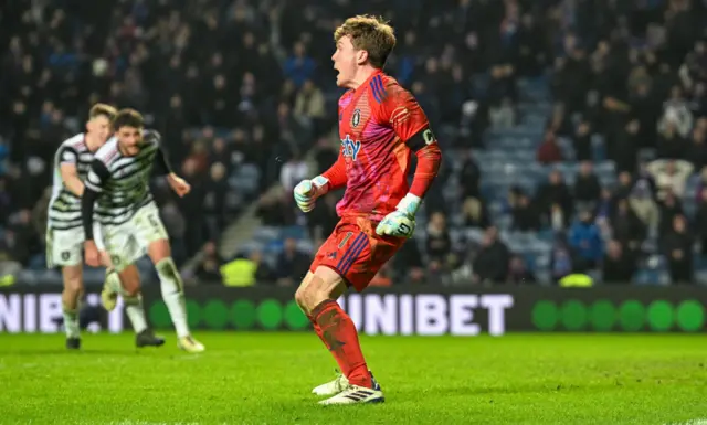 Calum Ferrie celebrates his stoppage-time penalty save