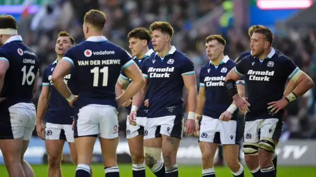 Scotland players stand dejected