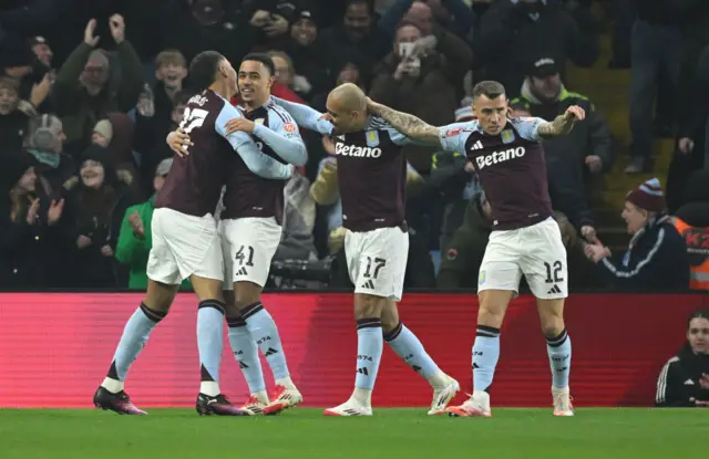 Jacob Ramsey of Aston Villa celebrates with teammate Morgan Rogers after scoring