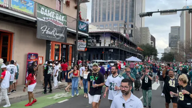 Fans walking to the Superdome in New Orleans for Super Bowl 59