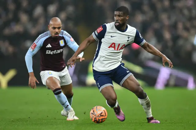 Tottenham's Kevin Danso runs with the ball