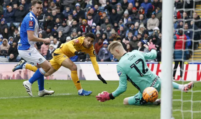 Wolverhampton Wanderers' Joao Gomes scores their first goal past Blackburn Rovers' Balazs Toth