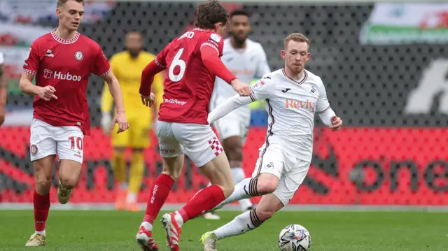 Lewis O'Brien of Swansea City takes on Max Bird of Bristol City