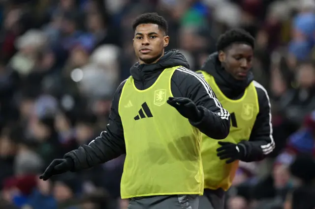 Marcus Rashford of Aston Villa warms up near the touchline