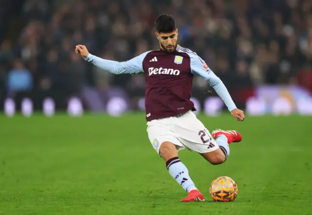 Marco Asensio of Aston Villa takes a free kick