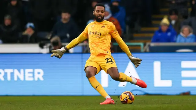 Lawrence Vigouroux kicks the ball