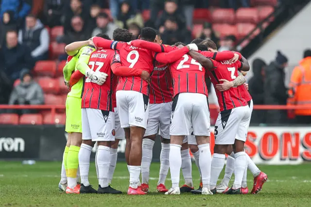 Walsall squad in team huddle