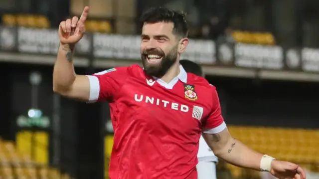 Wrexham's Elliot Lee celebrating scoring a goal