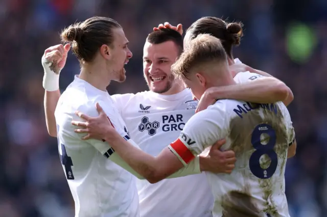 Preston's Milutin Osmajic celebrates with team mates after scoring