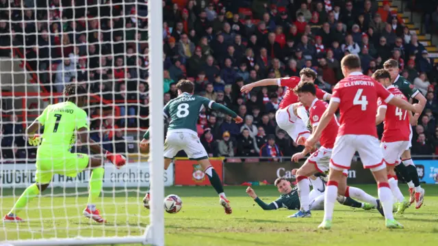 Szabolcs Schön of Bolton Wanderers scores but his goal disallowed