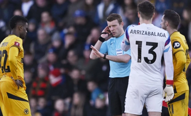 Referee Chris Kavanagh reacts