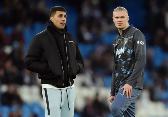 Manchester City's Rodri and Erling Haaland