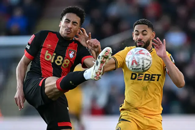 James Hill (L) vies with Wolverhampton Wanderers' Brazilian striker Matheus Cunha