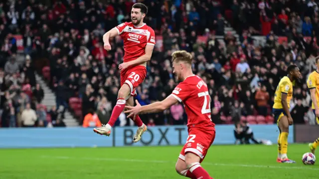 Finn Azaz celebrates scoring