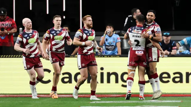 Bevan French celebrates his try