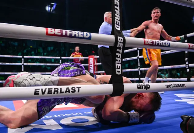 Lewis Crocker crashes to the canvas