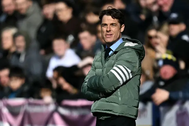 Scott Parker watches the players from the touchline