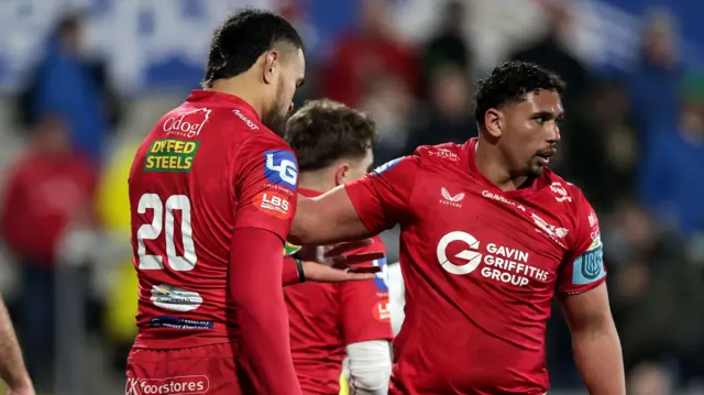 Vaea Fifita celebrates scoring Scarlets' third try