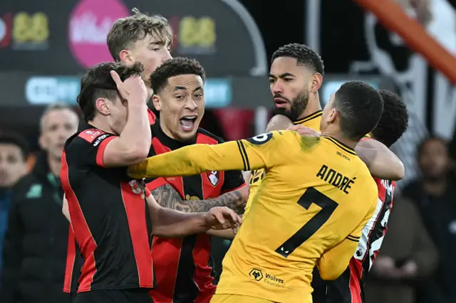 Matheus Cunha (3R) clashes with Bournemouth's Hungarian defender Milos Kerkez