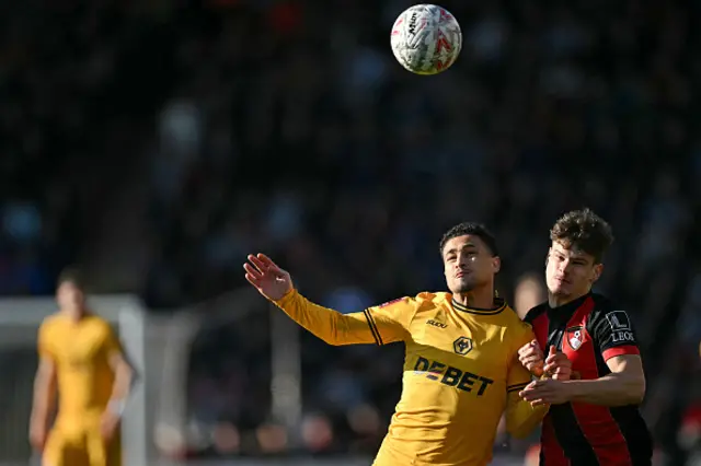 Joao Gomes (C) vie swith Bournemouth's Hungarian defender Milos Kerkez