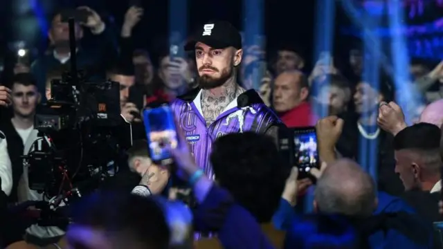 Lewis Croker enters the arena
