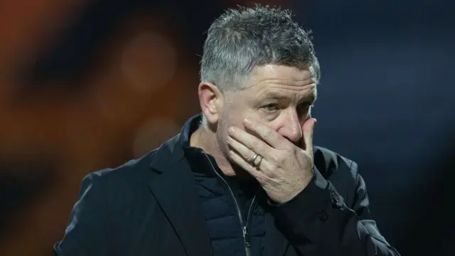 Dundee manager Tony Docherty looks dejected at full time during a William Hill Premiership match between Motherwell and Dundee at Fir Park