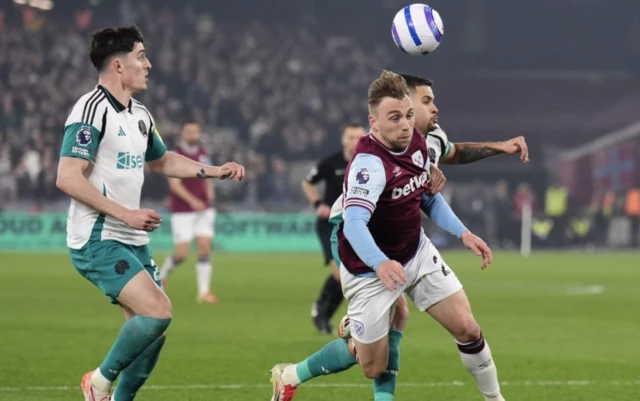 West Ham United's Jarrod Bowen goes down in the penalty box after a challenge by Newcastle United's Bruno Guimaraes