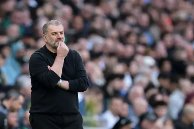 Tottenham manager Ange Postecoglou looks on