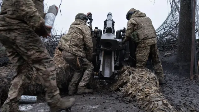 Ukraine soldiers fire a US made artillery weapon