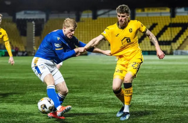 Livingston's Robbie Muirhead and St Johnstone's Zach Mitchell in action