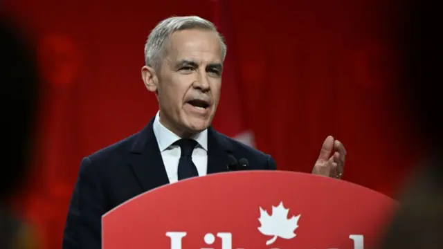 Mark Carney addresses a crowd after winning the Liberal leadership race