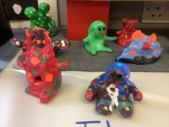 A picture of some aliens that children made for British Science Week