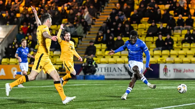 Adama Sidibeh scores before the flag goes up