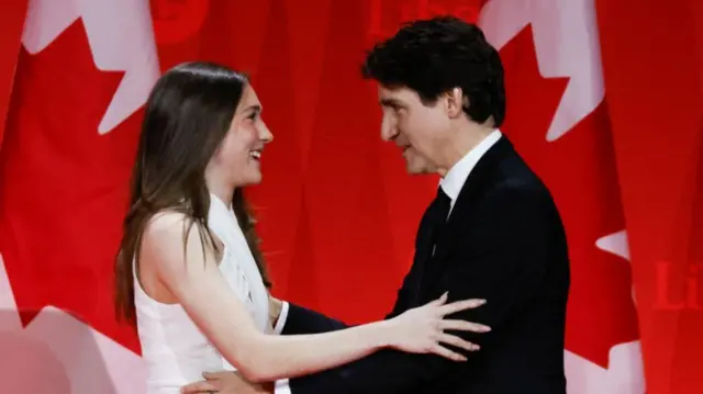 Justin Trudeau embraces his 16-year-old daughter, Ella-Grace.