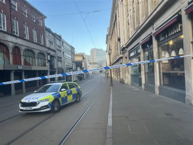 Tram tracks behind police tape