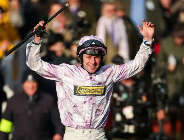 Golden Ace jockey Lorcan Williams celebrates winning the Champion Hurdle