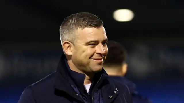 Bolton Wanderers boss Steven Schumacher smiling pre kick-off