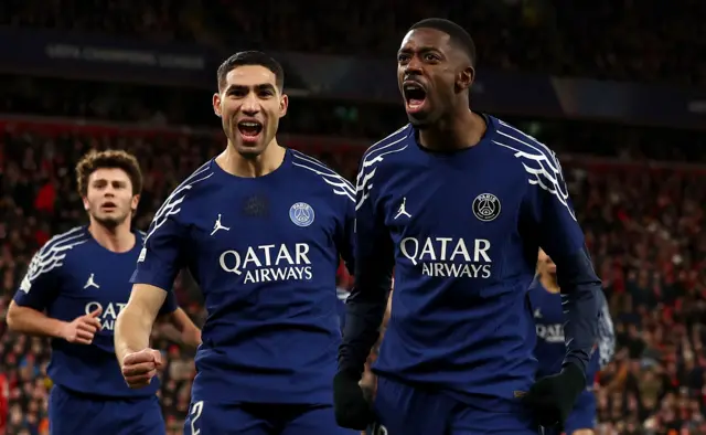 Ousmane Dembele (R) of PSG celebrates after scoring the opening goal.