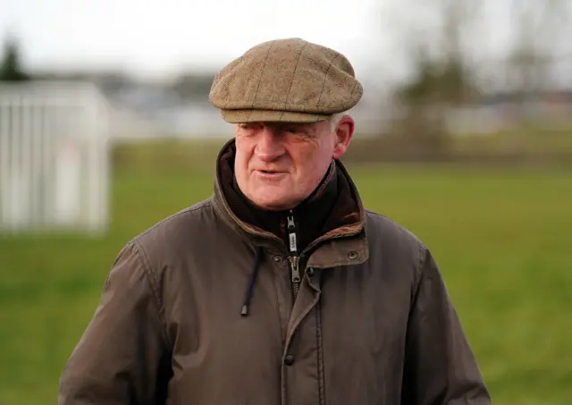 Trainer Willie Mullins looks on